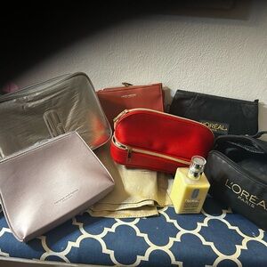 Clinique Red Leatherette Double-Zip bags al newe except the l oreal